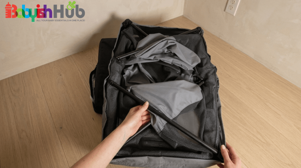 how to fold baby bjorn travel cot